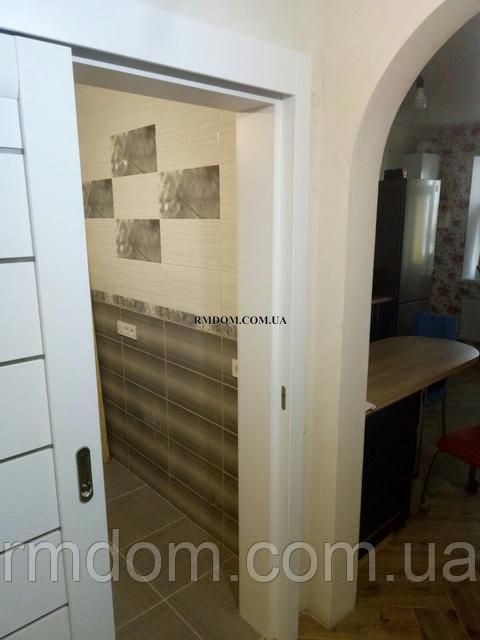 Монтаж дверного блоку з розсувною системою